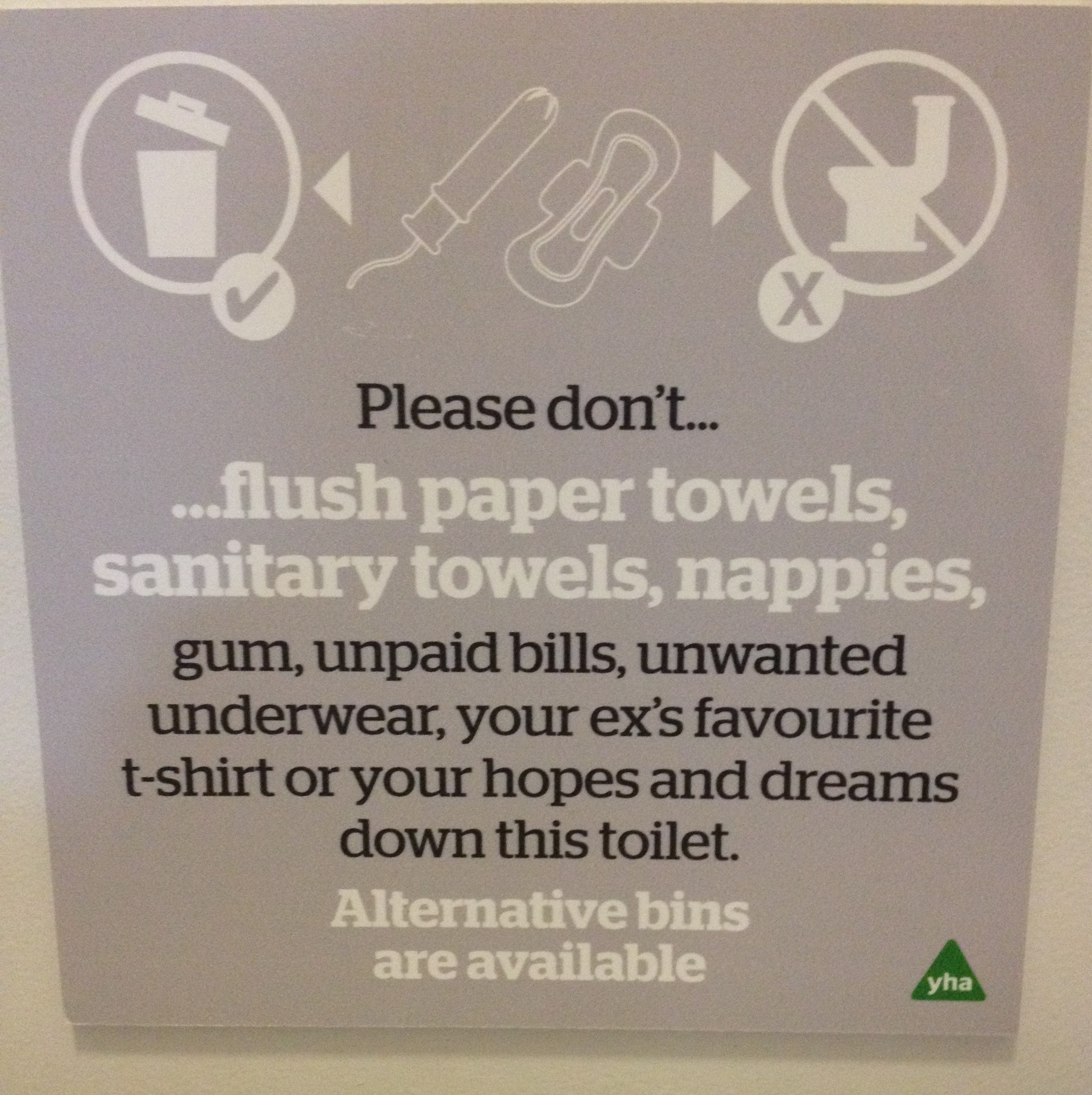 sign in a youth hostel toilet