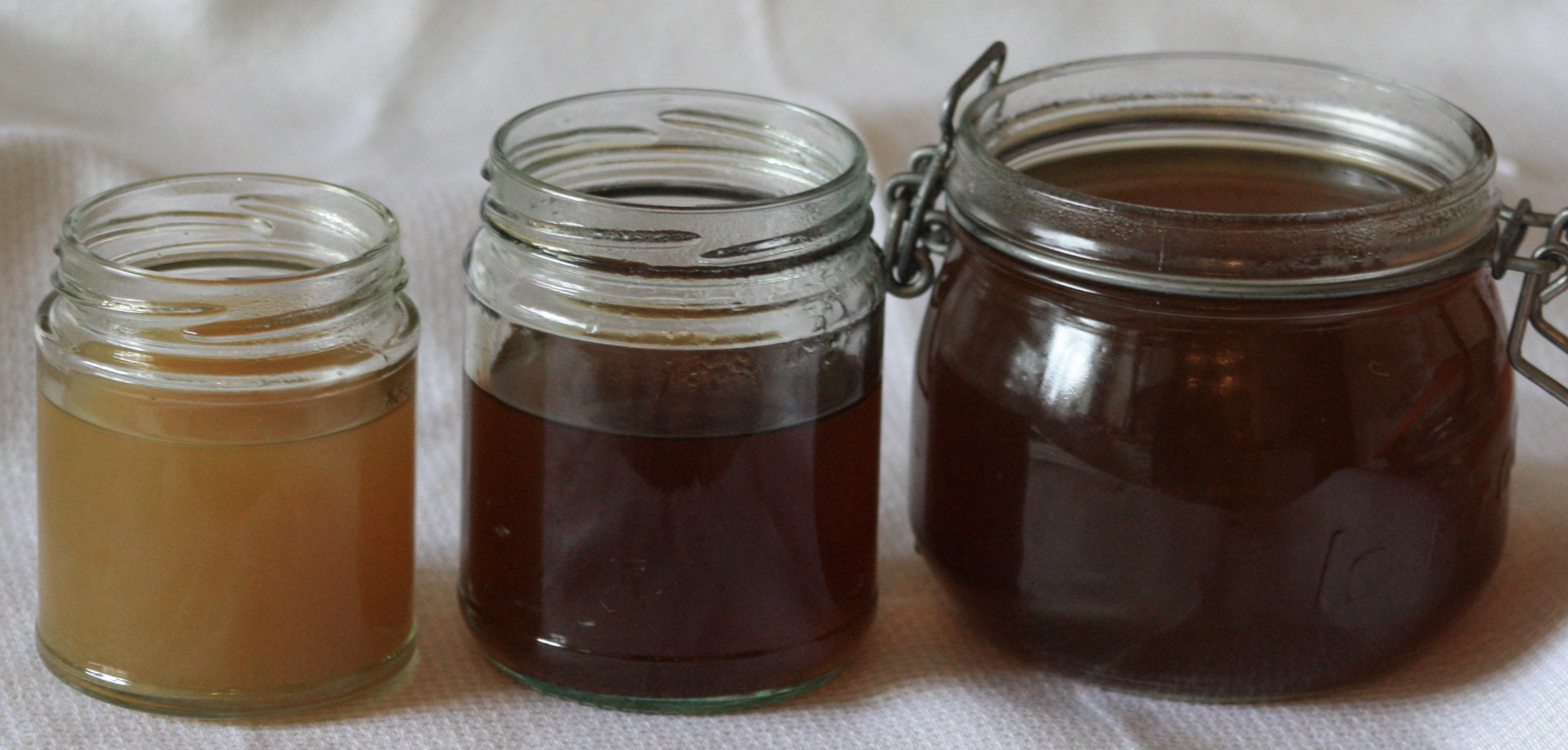 jars of brown liquid