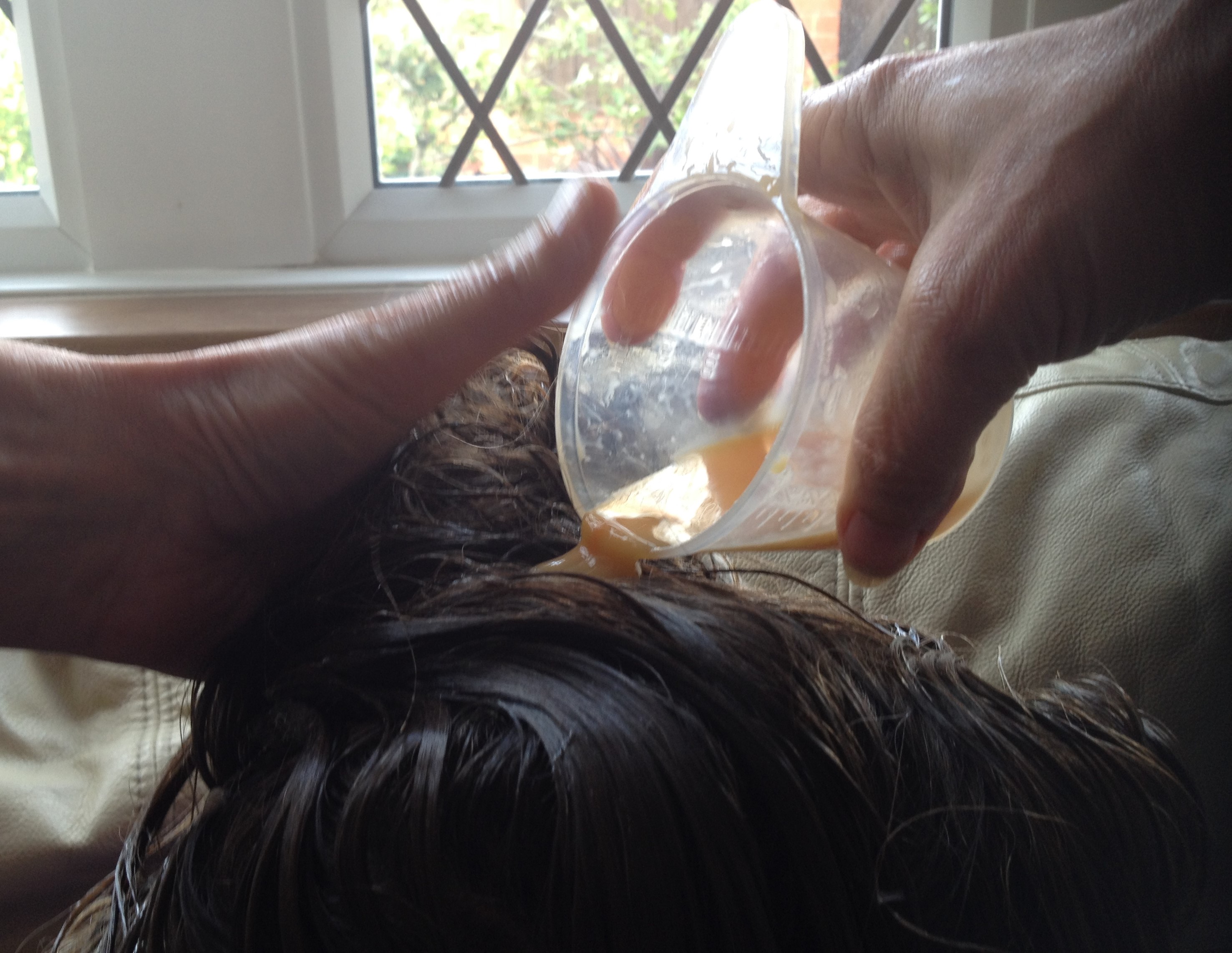 applying an egg hair mask