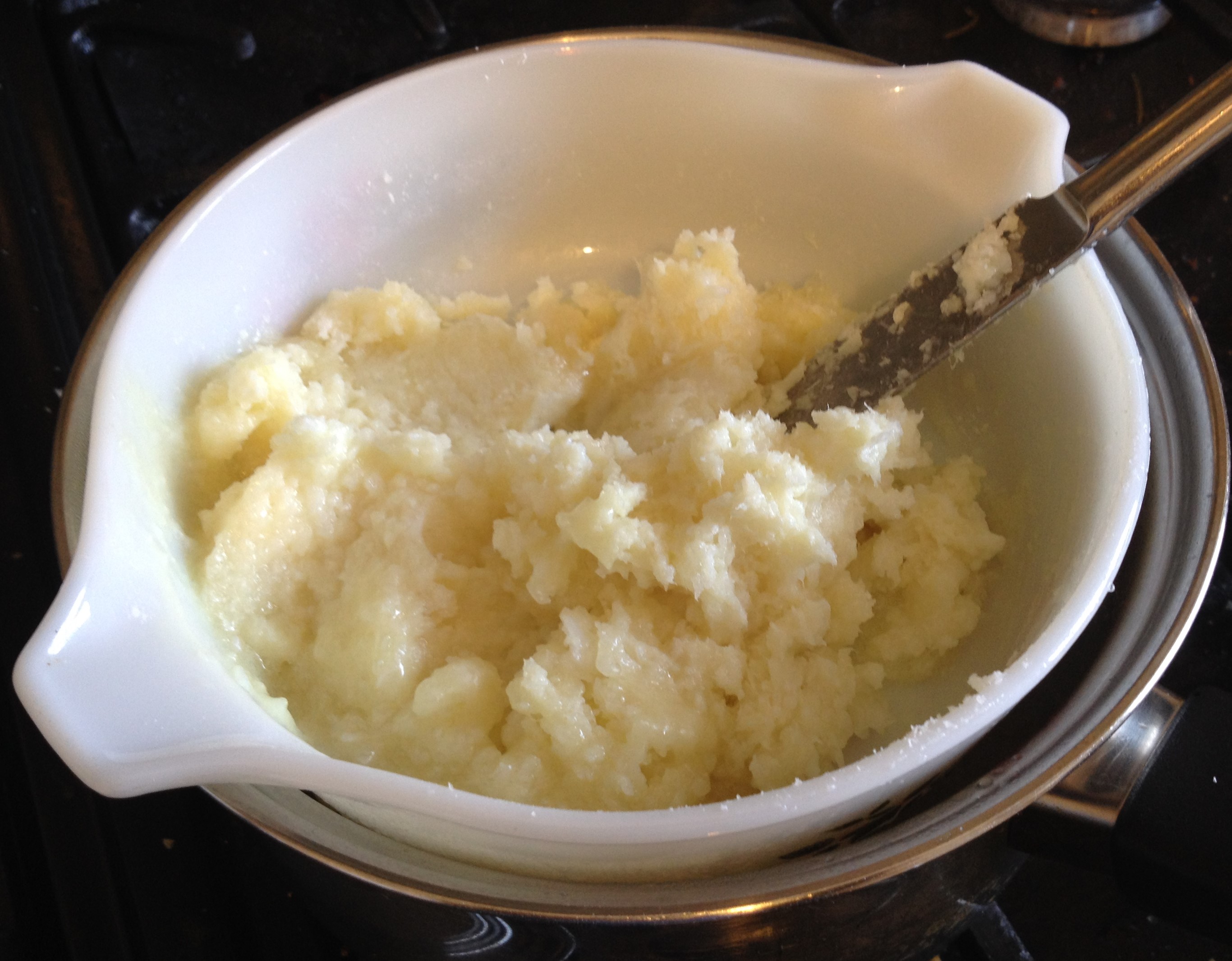 melting grated soap in a pan