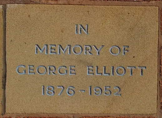 Sandstone memorial stone inscribed 'In memory of George Elliott 1876-1952'