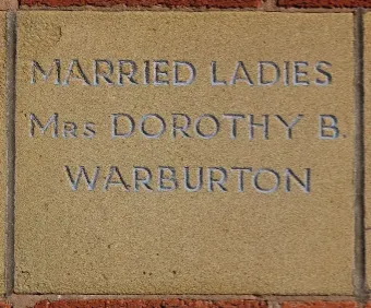 Sandstone memorial stone inscribed 'Married Ladies Mrs Dorothy B Warburton'