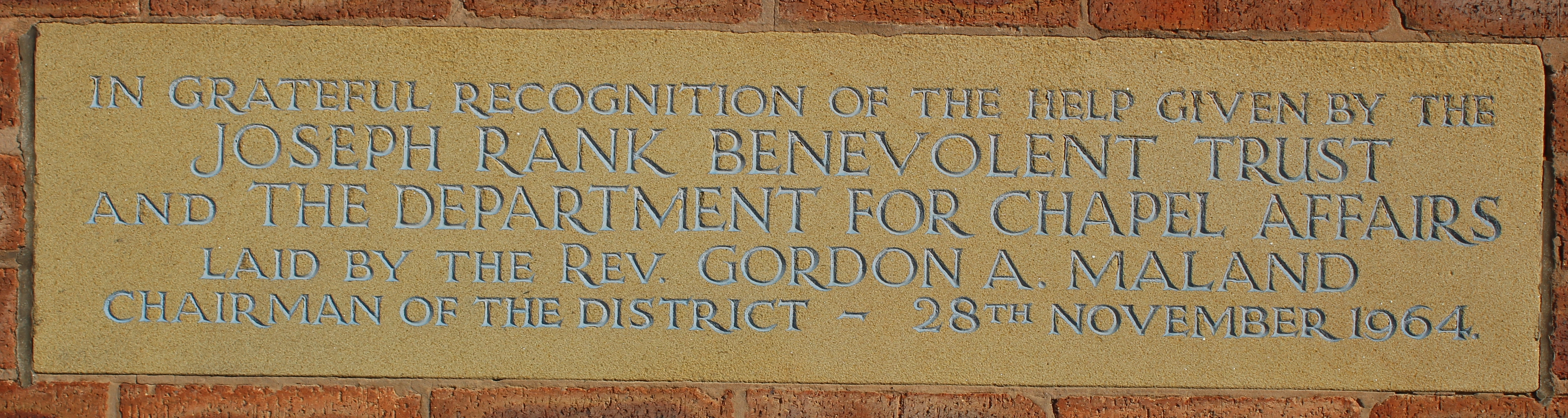 Memorial stone set in brickwork of Highfield Methodist Church Hall
