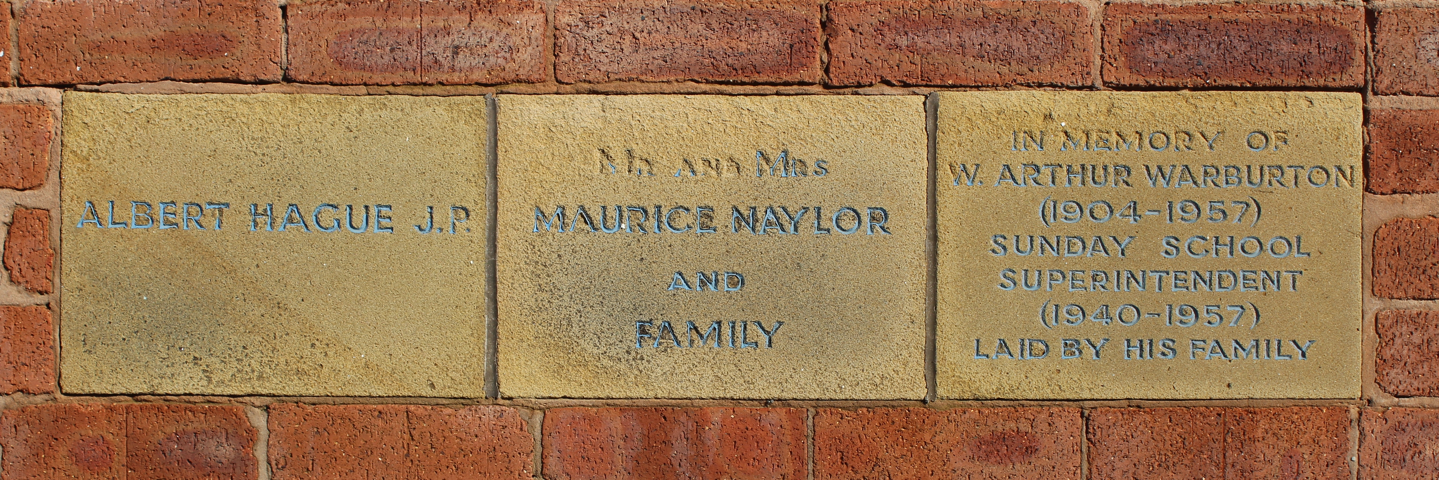 Three memorial stones set in brickwork of Highfield Methodist Church Hall