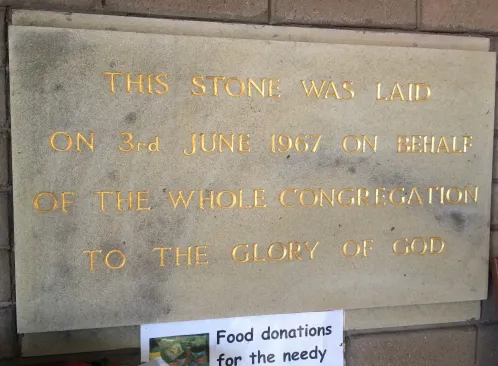 Grey stone with gold lettered inscription laid on behalf of the congregation commemorating the 1967 building of Lindale Methodist Church