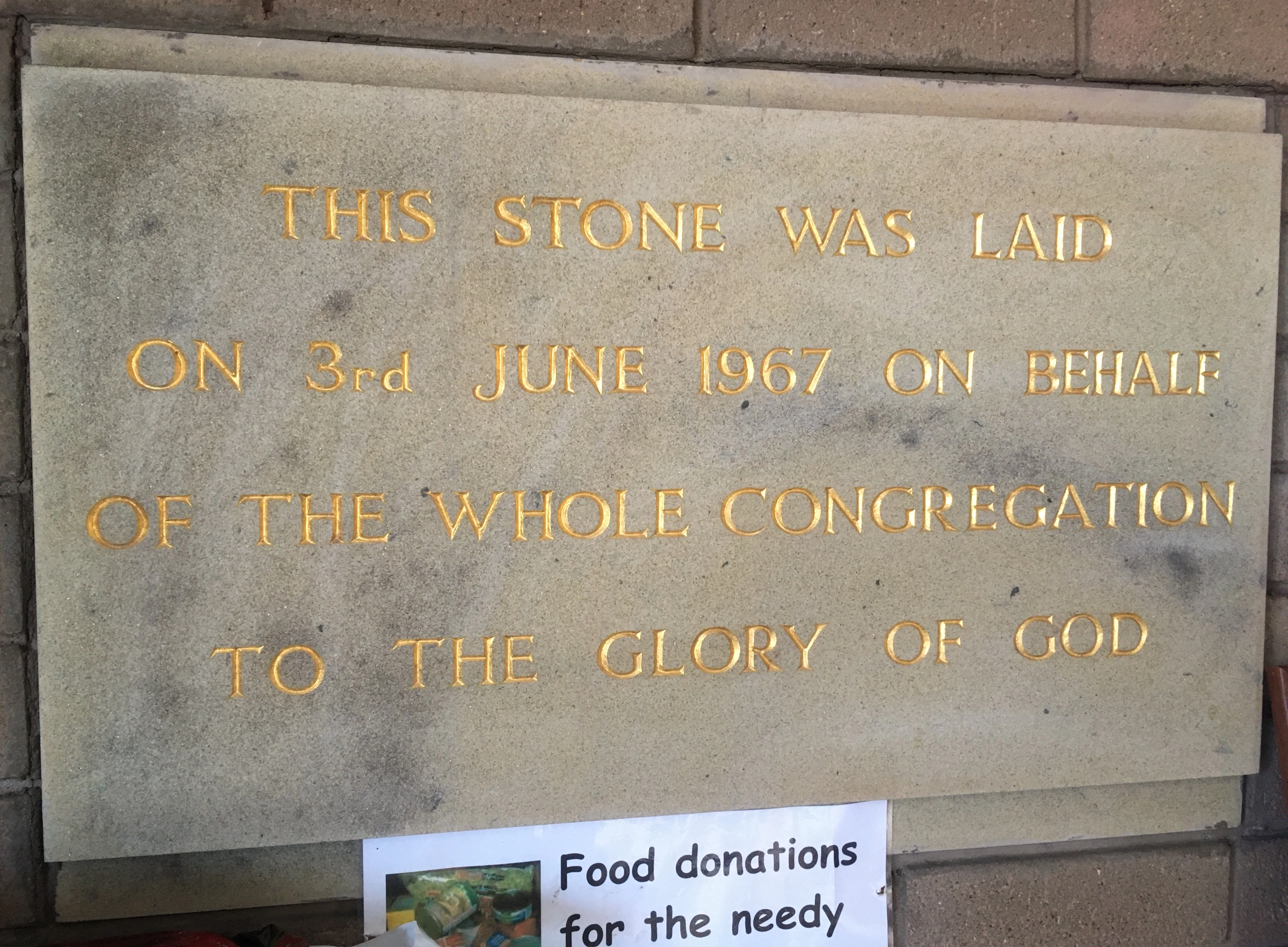 Grey stone with gold lettered inscription laid on behalf of the congregation commemorating the 1967 building of Lindale Methodist Church