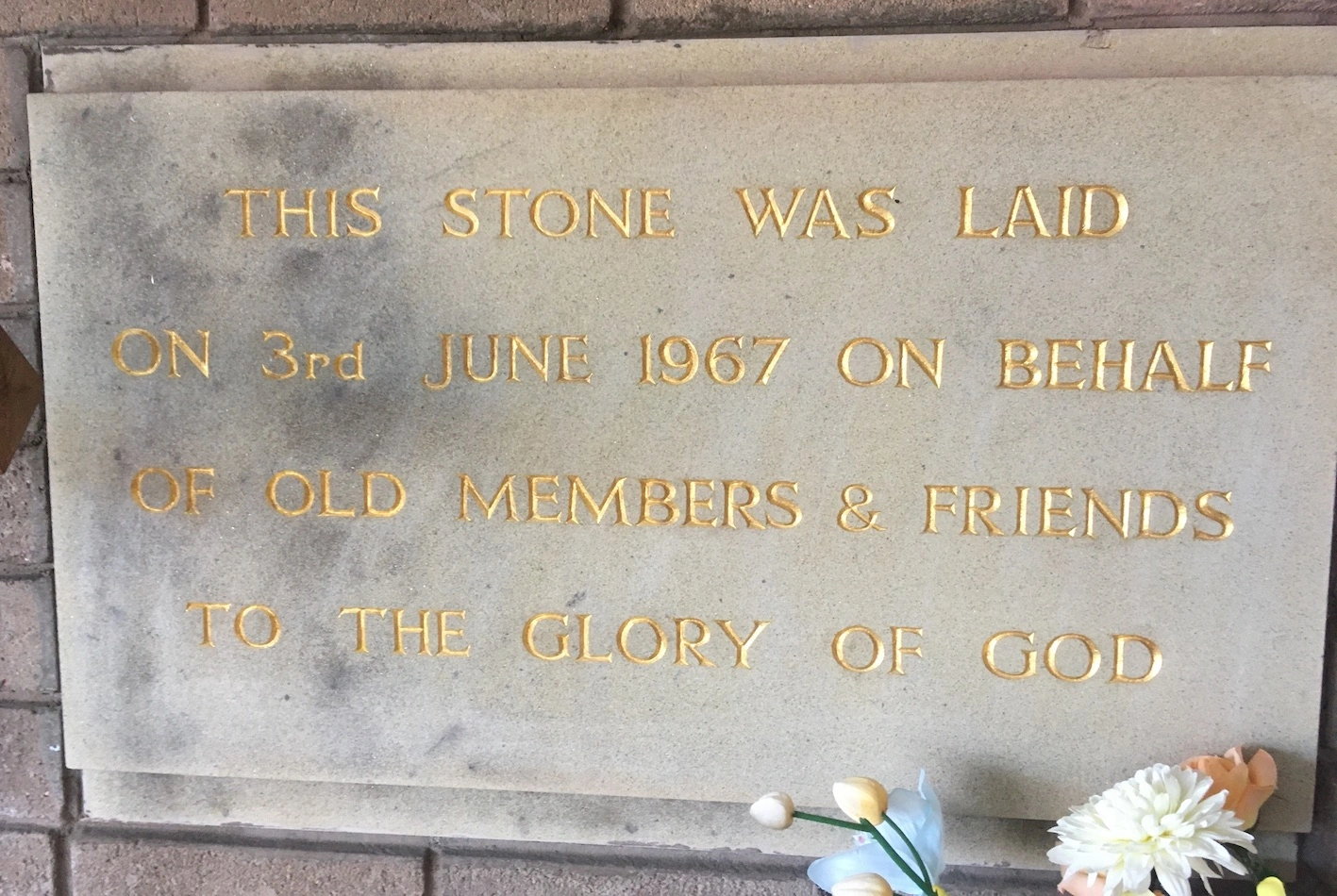 Grey stone with gold lettered inscription laid on behalf of old members and friends commemorating the 1967 building of Lindale Methodist Church