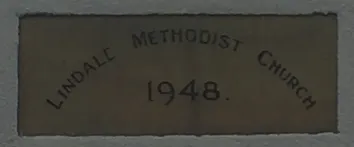 Stone showing name of Lindale Methodist Church and date 1948