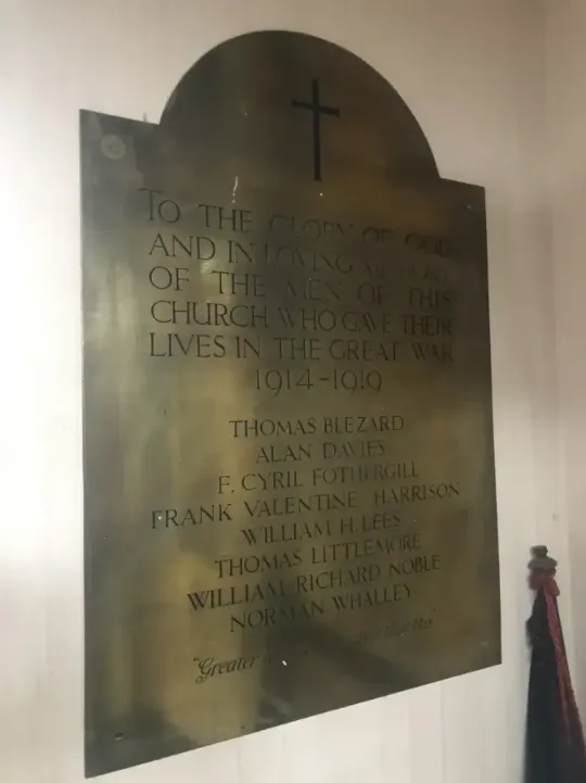 Refurbished First World War brass memorial plaque on a wall in Highfield Road Methodist Church