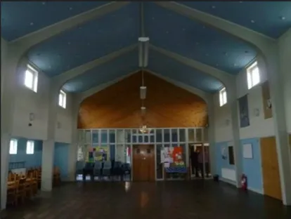 Large modern church hall, painted pale blue and white