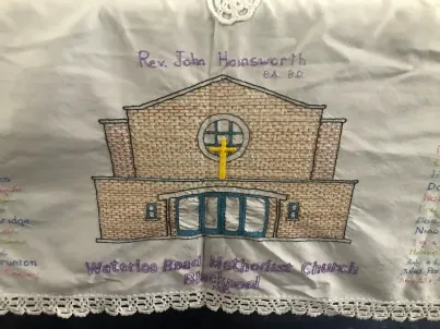 Detail of an embroidered cloth featuring Waterloo Road Methodist Church