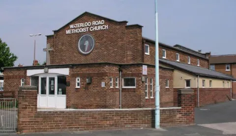 Modern brick built church building without a tower or spire